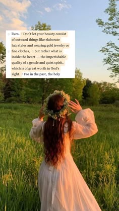 a woman in a white dress is standing in the grass with her hands on her head