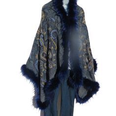 Unique Himalayan Yak/Sheep Wool Blend & Faux Fur Cape/Shawl/Wrap !!!…Ideal Unique Handcrafted gift for you, family, your friends and co-workers…!!! Handloomed/Handcrafted by Artisans Hand Embroidery Stitched Accents that Emphasize the Patterns in the Shawl Design,  Boiled Himalayan Yak/Sheep Wool Blend Shawl Handmade in Nepal Faux Fur | Black & Navy Tribal Design and Pattern A solid color Yak & Sheep Wool Blend of yarns hand loomed shawl in Nepal is handcrafted by a tribal family pattern and Full Faux Fur is added to the shawl... Yak Wool: The New Cashmere [The Guardian: December 2010] Hand loomed in Tibet, Nepal or India each piece is handcrafted by a tribal family pattern. _________________________________________________________ Yak Wool: Yak is an animal that lives high in Himalayan mo Bohemian Blue Cape Outerwear, Bohemian Blue Cape-style Outerwear, Traditional Blue Poncho, Traditional Blue One-size Poncho, Elegant Blue Shawl For Fall, Elegant Blue Fall Shawl, Blue Shawl Cape For Fall, Blue Bohemian Cape Shawl, Blue One Size Shawl For Winter