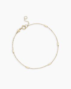 Achieve a truly timeless look with the 14k Gold Tatum Bracelet. This beautiful solid gold chain bracelet features dainty bar details, making it the perfect addition to your daily stack. To wear, stack alongside other solid gold or diamond bracelets. More is more! Tatum Bracelet in 14k Solid Gold, Women's by gorjana Turquoise Birthstone, Earrings Stacking, Solid Gold Charms, Gold Chain Bracelet, Solid Gold Bracelet, More Is More, Solid Gold Chains, 14k Gold Necklace, Mix Style