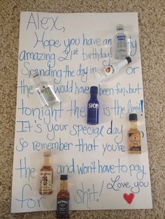 a handwritten birthday card with bottles and condiments laid out on the floor