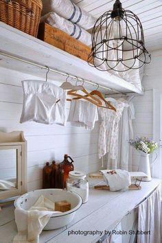 the laundry room is clean and ready to be used as a place for drying clothes