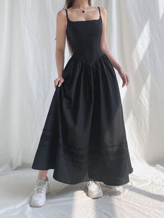 Turn heads with this stunning black maxi dress, serving major goth aesthetic goals. Crafted from smooth polyester, it features a stylish square neck and a chic back tie fastening. Plus, there's an invisible zip at the back for a seamless look. Whether you're hitting the town or keeping it chill, this dress is your new go-to for darkly dreamy style. Goth aesthetic Polyester Square neck Back tie fastening Invisible zip fastening at back Edgy Grunge Style, Grunge Corset, Strap Maxi Dress, Goth Dress, Maxi Styles, Looks Black, Vestidos Vintage, Grunge Goth, Lace Corset