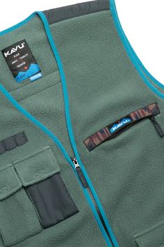 NEW! Did someone call for an adventure vest?? This felted sherpa fleece party vest boasts eight pockets - and if you’re on a KAVU adventure, you’ll use them all. The All Nighter boasts one secure zipper chest pocket with custom KAVU webbing, double cargo chest pockets bellowed at the side, a lower cargo pocket with bellows and Velcro flap, an exterior pocket with Velcro flap for tons of organization, plus on-seam hand pockets. Organization is great but this much fire needs to breathe - hence a fully mesh-lined back serves as a ventilation window to keep you cool. Design constructed this vest for fishing, camping, hiking, or pulling an all nighter. Like all things KAVU - engineered for good times. Casual fit, color blocked full zip vest, one chest zip pocket with patterned webbing and two t Winter Outdoor Vest With Side Pockets, Winter Vest With Side Pockets For Outdoor, Outdoor Winter Vest With Patch Pockets, Winter Outdoor Vest With Patch Pockets, Winter Vest With Patch Pockets For Outdoor Use, Winter Vest With Cargo Pockets For Outdoor Activities, Functional Adventure Outerwear With Side Pockets, Functional Outerwear With Side Pockets For Adventure, Winter Hiking Vest With Pockets