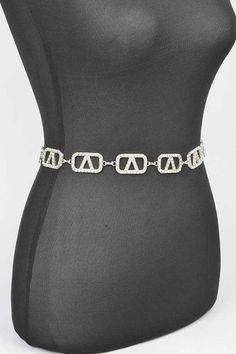 Complete your outfit with our Plus Size Rhinestone Logo Chain Belt. The sparkling rhinestones and sleek chain design not only add a touch of elegance but also provide comfortable support. Perfect for accessorizing your favorite dress or jeans, this belt is a must-have for any stylish plus size wardrobe. Plus Size / AdjustableWidth - 1"Length - 57.5"Composition - Rhinestone, MetalLead & Nickel Compliant Trendy Evening Jewelry With Chain Strap, Elegant Chain Belt For Party With Chain Strap, Chic Evening Chain Belt With Adjustable Chain, Chic Evening Waist Chain With Chain Strap, Chic Adjustable Chain Evening Belt, Chic Adjustable Chain Belt For Evening, Elegant Evening Waist Chain With Chain Strap, Elegant Chain Belt For Party, Elegant Waist Chain For Night Out