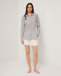 The Tencel-blend fabric makes this Air Linen Boyfriend Shirt especially breathable and soft. It’s classically tailored with a spread collar, drop shoulders and shirttail hem as well as button closures at the sleeve plackets. The Air Linen Boyfriend Shirt is styled with the Air Linen Boyfriend Short. Spring Shirt With Concealed Placket And Shirttail Hem, Spring Linen Shirt With Concealed Placket, Classic Linen Tops With Shirttail Hem, Classic Linen Top With Shirttail Hem, Linen Shirt With Button Cuffs And Shirttail Hem, Relaxed Fit Shirt With Spread Collar And Placket, Casual Blouse With Spread Collar For Business Casual, Relaxed Fit Spread Collar Shirt For Business Casual, Relaxed Fit Shirt With Roll-up Sleeves And Shirttail Hem