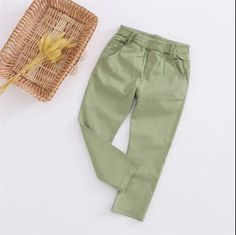 Experience the ultimate comfort and style with these trendy kids pants featuring a white seam, elastic waistband, front pockets, faux zipper, and a touch of harem design. Made of high-quality cotton linen, these pants have a unique jean-like texture and are available in 4 vibrant colors. Elevate your child's wardrobe with these must-have pants today! Trendy Cotton Bottoms With Pull-on Style, Trendy Cotton Pants With Elastic Waistband, Cotton Solid Color Harem Pants For Fall, Solid Color Cotton Harem Pants For Fall, Trendy Cotton Pull-on Bottoms, Trendy Cotton Harem Pants For Spring, Fall Solid Color Cotton Harem Pants, Cotton Ankle-length Jeans With Side Pockets, Cotton Straight Leg Solid Color Harem Pants