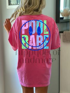 Cute Multicolor T-shirt For Vacation, Cute Multicolor Vacation T-shirt, Cute Pink Beach T-shirt, Playful Letter Print Beach Top, Playful Tops With Sublimation Print For Summer, Playful Letter Print Top For Beach, Multicolor Short Sleeve Tops For Poolside, Pink Screen Print Top For Beach, Pink Screen Print Tops For Beach Season