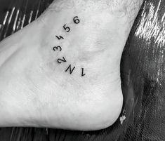 a foot with the word love written on it