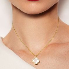 Trending for 2024, designer inspired and perfect for everyday. Beautiful and elegant Crystal accented gold mother of pearl Quatrefoil Pendant necklace. approx 14" - 16" chain extender to adjust to neckline 14K gold plated *Note processing time is not shipping time, our regular Free shipping takes approx. 5-6 days to receive after shipped. With rush processing your order is expedited and you will also be upgraded to priority mail approx 2-3 days to arrive once shippedExpress shipping is available Chic Gold Mother Of Pearl Jewelry, Communion Headpiece, Swarovski Tiara, Crystal Purse, Wedding Necklace Set, Wedding Hair Headband, Bow Necklace, Chain Extenders, Bridal Bracelet