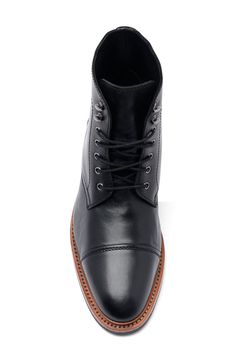 A cap toe and classic details add timeless appeal to this lace-up leather boot with a Goodyear welt stitched to a durable rubber tread. Leather upper and lining, rubber sole Imported Asian Owned/Founded Cap Toe Boots, A Cap, Leather Boot, Goodyear Welt, Boots Men, Leather Boots, Nordstrom Rack, Rubber Sole, Leather Upper