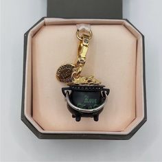 Please visit  for more products and promotions. Juicy Couture pot of gold charm. No box is included! The box in photo is for display only! I did not keep all the charm boxes when I store them. Retired charm! Hard to find! I combine shipping. Note: Some charms I have for sale are reproduced from the original Juicy Couture factory, others are from my own collection in the past 10 years.  All Juicy Couture charms are all from the same factory no matter the reproduction ones or the ones were produce Gold Jewelry With Logo Charm For Collectors, Metal Logo Charm For Gifts, Juicy Couture Charms, Pot Of Gold, Gold Charm, Charm Bracelets, Juicy Couture, Hair And Nails, Lashes