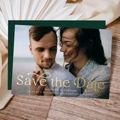 a save the date card with a photo of a man and woman in love on it