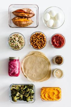 an assortment of food items are arranged in the shape of a circle on a white surface