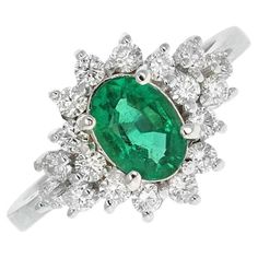 2.25 Carats Natural Emerald and Diamond 14K Solid White Gold Ring Suggested Replacement Value: $5,200.00 Total Natural Green Emerald Weight is: Approx. 1.50 Carats (transparent) Emerald Measures: 9 x 7mm Natural Round Diamonds Weight: Approx. 0.75 Carats (color G-H / Clarity SI1-Si2) Ring size: 7 (free re-sizing available) Ring total weight: Approx. 4.5 grams Disclaimer: all weights, measurements and colors are approximate and may vary slightly from the listed dimensions or as seen in the image. White Gold Ring, Green Emerald, Emerald Diamond, Natural Emerald, Ring Size 7, White Gold Rings, Cocktail Rings, Emerald Green, Gold Ring