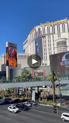 the las vegas strip is busy with cars and billboards