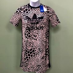 Nwt Adidas T-Shirt Dress Animal Print Size Xs Measurements Are Approximate And On Flat Surface (Inches) Shoulder: 14.5" Bust: 18" Length: 34" Sleeves: 9.5" White Crew Neck T-shirt Dress With Graphic Print, White Graphic Print T-shirt Dress With Crew Neck, Black Mini Dress With Graphic Print And Short Sleeves, Black All Over Print Dress For Spring, Black Dresses With All Over Print For Spring, Black Spring Dress With All Over Print, Casual Fitted Dresses For Streetwear, Spring Streetwear Dress With Crew Neck, Casual Crew Neck Dress For Streetwear