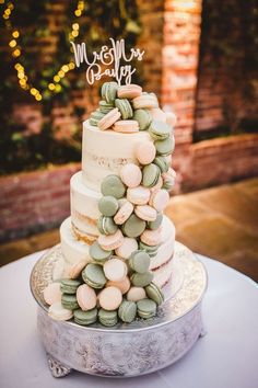 a wedding cake with macaroni and cheese on top