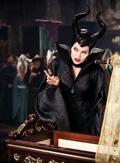 maleficent in the movie maleficent with horns on his head and red lips