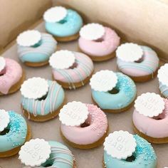 a box filled with donuts covered in frosting