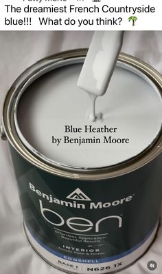 a can of blue heather by benjamin moore is shown with the caption that reads, the greatest french countryside blue what do you think?