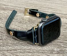 Slim Black Leather & Gold Accents Apple Watch Band. 8mm Genuine Leather Strap with Adjustable Buckle. Designed And Handmade by Simeon D Jewelry Studio. Adjustable Size Bracelet Perfectly Tailored to Fit Your Wrist. This Bracelet Fits ALL Apple Watch Series. Please Measure Your Wrist Before Submitting Your Order! Not For Other Models. Apple Watch Is NOT Included! Follow my Studio on Social Media for Updates & New Designs. Apple Watch Wristbands, Apple Watch Bands Women, Rose Gold Apple Watch, Apple Watch Sizes, Gold Apple Watch, Smart Jewelry, Gold Apple, Apple Watch Bands Leather, Apple Watch 38mm