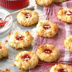 some biscuits with jam on top of them