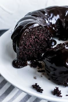 a chocolate bunt cake on a white plate