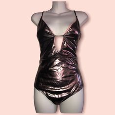 Ultra Sexy Xoxo Deep Plung Metallic One-Piece Swimsuit With Crisscross Straps Pewter Color With Pink Lining Never Worn Size Xl Removable Bra Inserts Adjustable Shoulder Straps Summer V-neck Bodysuit For Club, Fitted Crisscross Bodysuit For Summer, Summer Party Bodysuit With Crisscross Straps, V-neck Bodysuit For Night Out With Lined Body, Party Swimwear With Crisscross Straps And Backless Design, Summer Bodysuit With Crisscross Straps, Fitted Bodysuit With Crisscross Straps, Glamorous Swimwear For Summer Night Out, Summer Party Swimwear With Crisscross Design