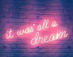 a neon sign that says it was all a dream