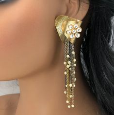 Matte Gold Jhumka/Indian Jhumka/Golden Pearl Jhumka/Traditional Jhumka/Ethnic Golden Matte/Gold finish earrings/Ethnic Indian Long Jhumka Length: Approx. 4.5 Inches This pair of earring is made in Matte Gold finish with Semi precious stone beads with Push back closure. Very Elegant and stylish, these earrings can be paired with any traditional Indian or Western Attire depending upon the occasion and the theme. Very lightweight, hand carved and made with with extreme love and care. This earring w Long Jhumka, Traditional Jhumka, Rain Earrings, Matte Gold Earrings, Indian Jhumka, Gold Jhumka, Cocktail Earrings, Golden Pearl, Contemporary Earrings