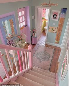 the stairs are painted pink and white