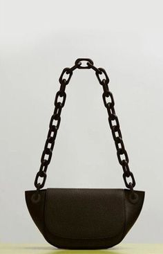 "Pebbled vegan leather purse with chunky acrylic chain. Measures approx. 12.5\" long, 6\" tall, 2\" deep." Leather Chain Shoulder Bag For Office, Everyday Leather Shoulder Bag With Gold Chain, Brown Leather Shoulder Bag With Chain Detail, Everyday Leather Shoulder Bag With Chain, Leather Shoulder Bag With Chain Link For Everyday, Modern Shoulder Bag With Chain For Everyday Use, Leather Chain Link Bag For Everyday Use, Leather Chain Link Shoulder Bag For Everyday, Faux Leather Biker Jacket