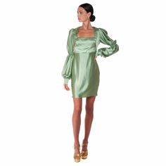 This elegant short dress made of pure light green silk is characterized by a refined style that gently highlights the female figure. A fitted bodice with darts at the breast and a square neckline. Wide sleeves are curled on the ridge, and fastened at the wrist with three hand-covered buttons. A sophisticated and luxurious dress to add to your wardrobe. Square neckline Long sleeves Center back opening with invisible zip Pencil skirt Internally lined bodice Lockable wrist with three hand-covered b Short Light Green Dress, Elegant Short Dress, Luxurious Dress, Light Green Dress, Elegant Dresses Short, Halterneck Mini Dress, Lace Back Dresses, Luxurious Dresses, Artisan Fashion