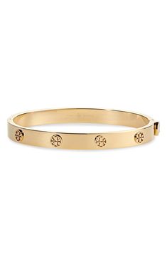 Logo medallions lend a stunning signature element to this gleaming goldtone bangle. Style Name:Tory Burch Miller Hinge Bracelet. Style Number: 6143216. Tory Burch Watch, Tory Burch Bracelet, 16 Candles, Hinge Bracelet, Preppy Jewelry, Us Fashion, The Sweetest Thing, Sweetest Thing, Tory Burch Jewelry