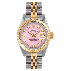 Swiss Wrist - SKU 6917-TT-WMOP-DIA-AM-FLT-JBL Brand : Rolex Model : Datejust (Non-Quickset Model) Gender : Ladies Metals : 14K/Stainless Steel Case Size : 26 mm Dial : Custom Pink Mother Of Pearl Diamond Dial (This dial is not original Rolex And has been added aftermarket yet is a beautiful Custom addition) Bezel : Original Rolex 14K Yellow Gold Fluted Bezel Bracelet : Original Rolex 14K Yellow Gold And Stainless Steel Jubilee Band (This band will fit up to a 6.5 inch wrist) Condition : Fully Serviced, Polished, Time-Tested - Please refer to the images!! Warranty : 1 year warranty. Warranty on the movement is valid 1 year from the date of purchase. Warranty does not cover abuse, accidental damage or water damage. Customer is responsible for shipping expenses in the event warranty work is r Two Tone Datejust, Rolex Datejust Women, Rolex Vintage, Wooden Watch Box, Rolex Diamond, Bezel Bracelet, Gold Rolex, Expensive Handbags, Crystal Watches