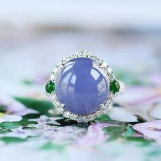 * Condition: Brand new * Center Stone: 5A+ Natural Violet Purple Jade, Round Cabochon Cut * Side Stone:  Natural Green Jade Natural White Diamond, Round Brilliant Cut (VVS clarity with F color) * Ring Dimension: 19*19.5*12mm * Ring Weight: Approx 8.47g * Each piece is made-to-order with care and special attention to detail.  all items are made with conflict-free diamonds and gems. * The item will be gift wrapped and shipped. ------------------AUTHENTICITY------------------ Authenticity is the ba Luxury Jewelry Box, Purple Jade, Violet Purple, Green Jade, Color Ring, Diamond Halo, Jade Green, Conflict Free Diamonds, Halo Diamond