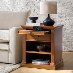 This traditional-style nightstand brings classic charm with modern functionality to your bedroom. Designed with convenience, it features a top pull-out tray, suitable for extending your space for reading materials or a cup of tea. Below, a spacious drawer provides ample storage for personal items, keeping your essentials close at hand. Inside the nightstand, an adjustable shelf offers flexible storage options for different-sized belongings. On the back, you’ll find a built-in power station with Shelf Nightstand, Style Nightstand, Reading Materials, Led Light Strip, Light Strip, Adjustable Shelf, Led Light Strips, Dressers And Chests, Power Station