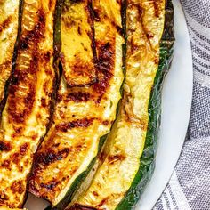 grilled zucchini on a white plate