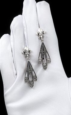 Sterling Silver Gothic Earrings, Medieval Jewelry, Witchy Earrings, Gothic Gift for Goth Girl, Handmade Vintage Earrings, Womens Gift Elevate your style with our Sterling Silver Gothic Earrings, meticulously crafted to capture the essence of Gothic charm. Each pair is designed with intricate details and craftsmanship, perfect for those who appreciate the dark allure of Gothic fashion. Whether you're attending a formal event or simply expressing your unique style, these earrings are sure to make Gothic Drop Earrings Pierced, Medieval Style Handmade Earrings For Gift, Classic Silver Chandelier Earrings For Pierced Ears, Classic Silver Chandelier Earrings, Gothic Sterling Silver Earrings For Formal Occasions, Victorian Dangle Earrings With French Hook, Victorian Style Silver Pierced Earrings, Victorian Silver Pierced Earrings, Classic Dangle Plug Earrings