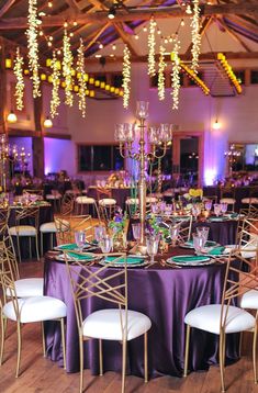 A Mardi Gras event with purple linened tables, gold chairs, and emerald green napkins. Mardi Gras Wedding Theme Receptions, Mardi Gras Themed Wedding, Mardi Gras Wedding Reception, Mardi Gras Table Centerpiece Ideas, Mardi Gras Gala, Mardi Gras Aesthetic, Ball Themes, Mardi Gras Party Ideas