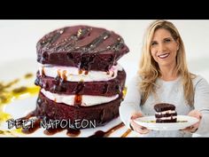 a woman holding a plate with three desserts on it and the caption beet nappoleon