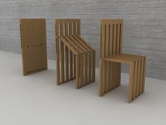 four wooden chairs sitting next to each other in front of a brick wall and door