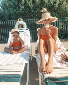 two women sitting on lounge chairs with one holding an ice cream cone in her hand