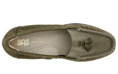 This classic loafer with modern touches is a great choice for women of any age. Two tassels adorn the top of the hand-laced shoe. An elasticized topline hugs soft leather to the foot for a secure but comfortable fit. Genuine moccasin construction, strategic cushions, and a shock-absorbing lightweight sole help provide all day comfort.
Heel Height: 0.875". This item features a removable footbed.
Final Sale: Last Chance items are not eligible for returns. Sas Shoes, Custom Made Shoes, The Hope, Shoes Shop, Sleek Fashion, Shoe Care, Last Chance, Leather Slip Ons, Classic Looks