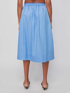 A classic button down, pleated midi skirt with a defined waist and the ultimate feminine vibes. Pairs well with a white tee and whatever your weekend plans are… (This one comes in Day Trader.) | Women's Idra Skirt in Day Trader | Ethical Essentials Summer Cotton Pleated Skirt, Relaxed Fit, Summer Pleated Hem Bottoms For Daywear, Cotton Summer Pleated Skirt, Summer Daywear Bottoms With Pleated Hem, Summer Bottoms With Pleated Hem For Daywear, Cotton Midi Length Bottoms For Summer, Summer Cotton Pleated Midi Skirt, Summer Cotton Pleated Skirt For Daywear, Summer Daywear Cotton Pleated Skirt