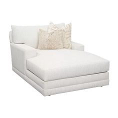 a white chaise lounge chair with two pillows on the back and one arm folded down