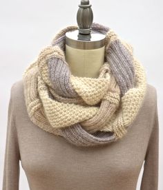 a knitted cowl is shown on top of a mannequin torso with the words challah pam powers knits