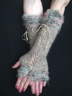 "Fingerless Gloves Long Corset Arm Warmers I have handknitted these Fingerless Gloves using top quality soft 40% wool, 10% mohair and 50 % poly-amide mixed yarn for the basic part and added pink green eyelash yarn for the upper and lower parts of the gloves and light brown laces One size fits most. The length of the gloves without stretching- 32cm/12.5\" These gloves are available also in many other colours, please, check my glove sections for that http://www.etsy.com/shop/LaimaShop?section_id=7 Long Corset, Gloves Long, Eyelash Yarn, Sassy Hair, Diy Crochet Projects, Mitten Gloves, Pink Brown, Diy Crochet, Crochet Clothes