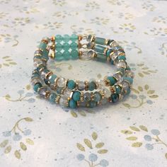 Never Been Worn, Brand New. Beautiful Colors! Adjustable Turquoise Crystal Bracelet In Bohemian Style, Bohemian Adjustable Turquoise Crystal Bracelet, Turquoise Bohemian Crystal Bracelet, Spiritual Beaded Turquoise Wrap Bracelet, Spiritual Turquoise Beaded Wrap Bracelet, Turquoise Amazonite Beaded Bracelets With Gemstone Beads, Green Bohemian Stretch Bracelet With Faceted Beads, Turquoise Crystal Bracelet With Colorful Beads, Turquoise Bohemian Bangle Crystal Bracelet