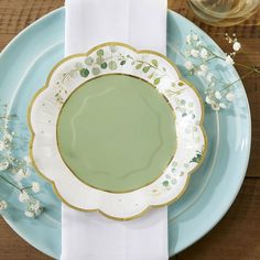 an empty plate on top of a blue and white plate